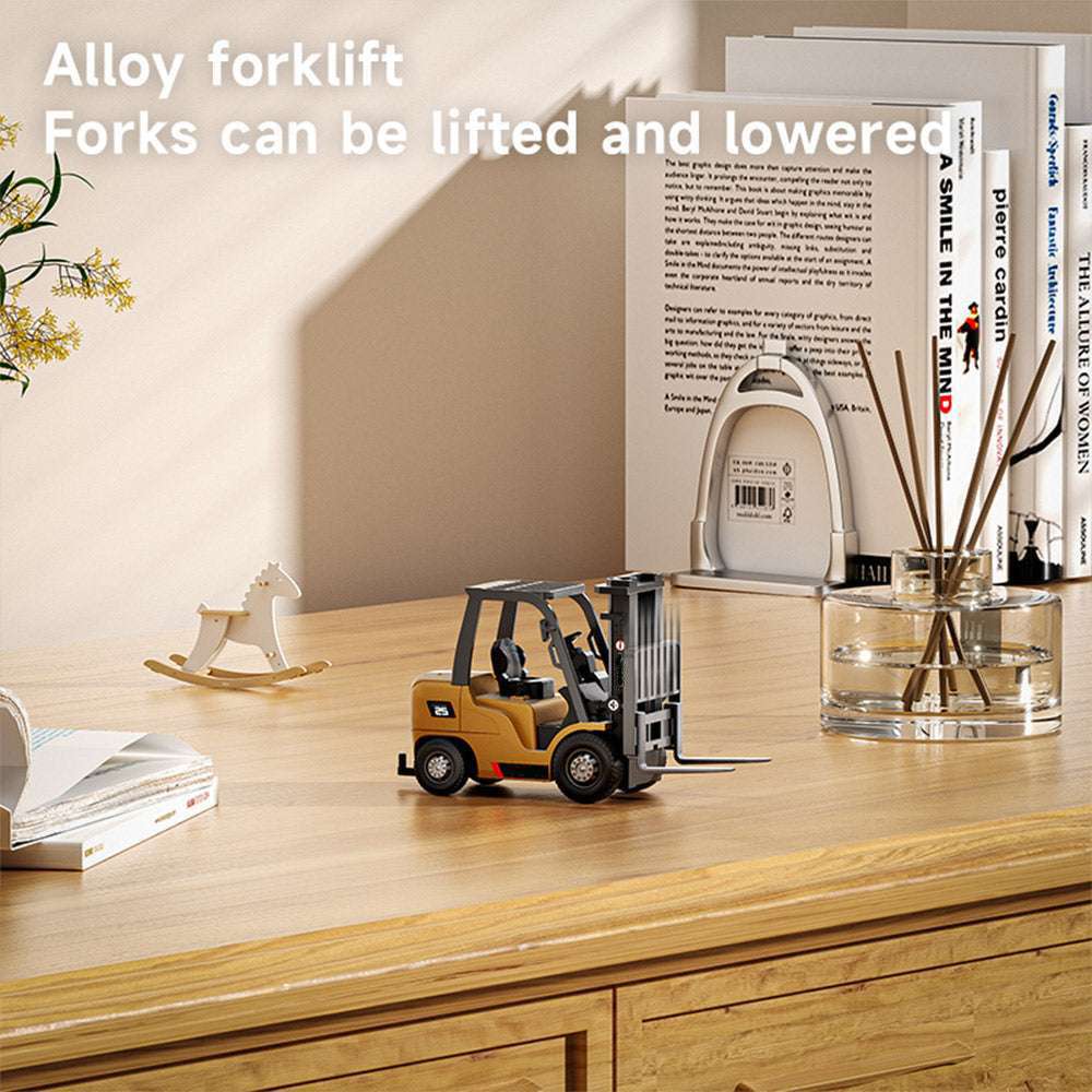 Mini remote control forklift working on a desk