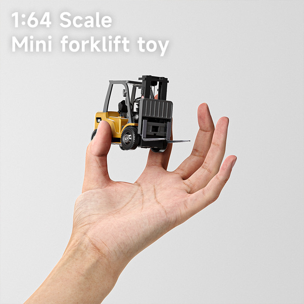 Hand holding 1:64 scale mini forklift