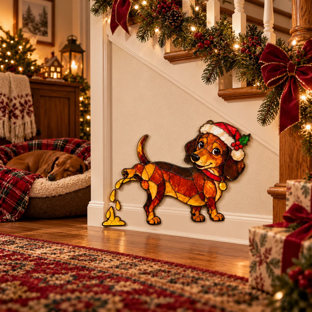 Dachshund Christmas decoration displayed beside a staircase with Christmas greenery