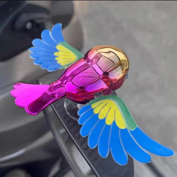 Close view of the red Flying Birds vehicle decoration and colorful wing panels