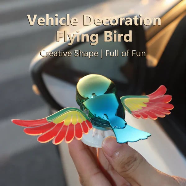 Flying bird vehicle decoration held by its clear suction-cup base