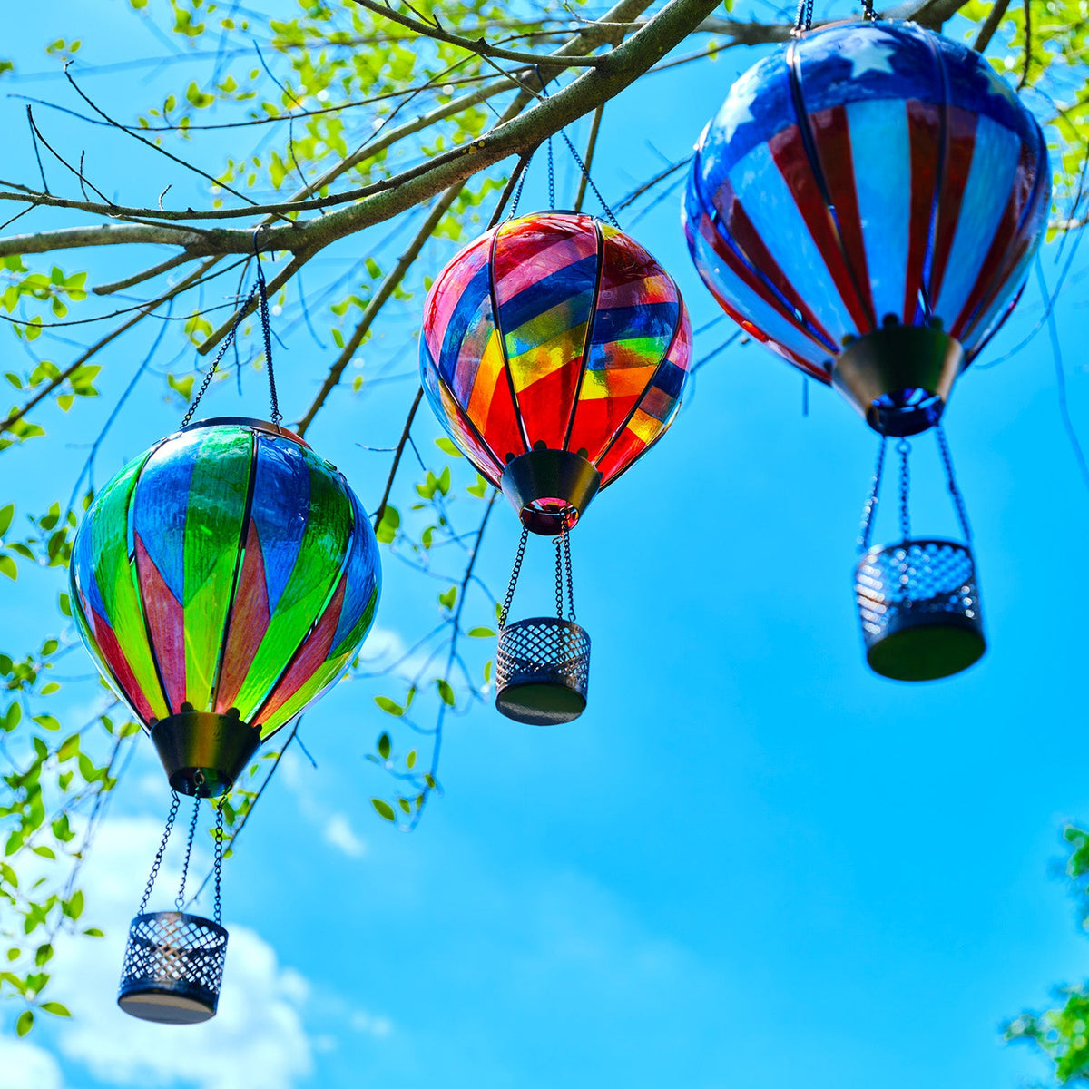 Hot air balloon solar lantern with vibrant rainbow panels, perfect for backyard solar lights and colorful yard lantern displays
