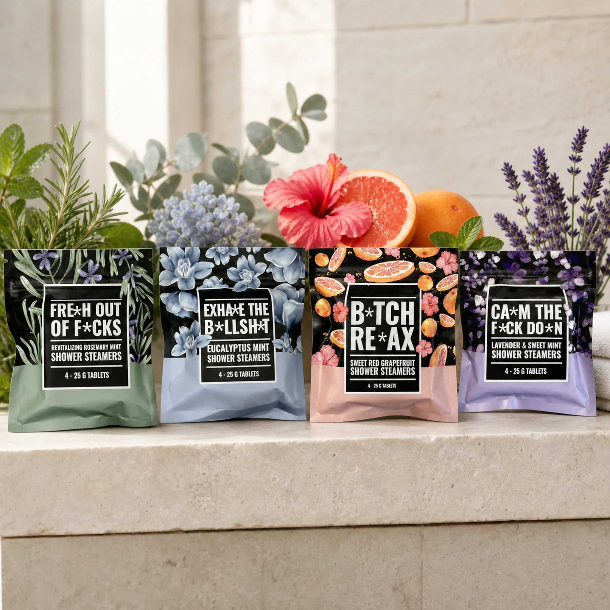 Four Swear Shower Steamers scent pouches arranged with botanical scent cues