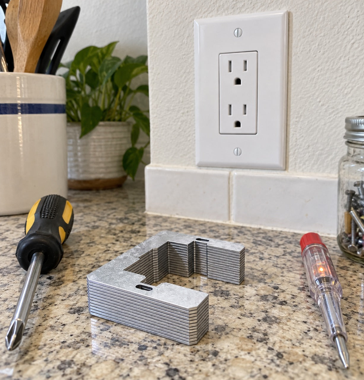 Illustrative buyer-style scene with wall plate spacers and a finished flush outlet