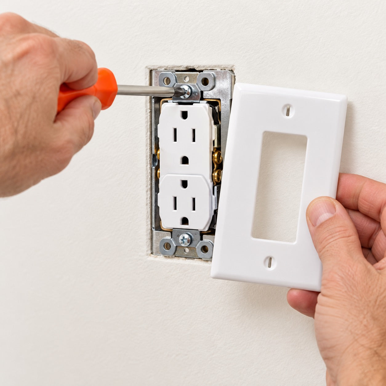 Tighten the outlet and reinstall the wall plate flush to the wall